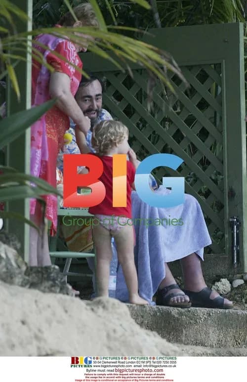 Pavarotti Relaxes with Family on Caribbean Beach
