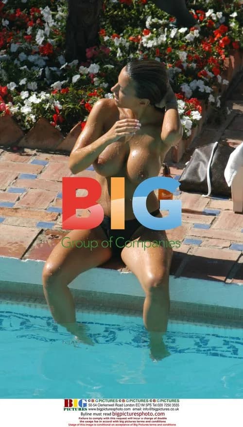 Model Lucy Becker sunbathing in Spain