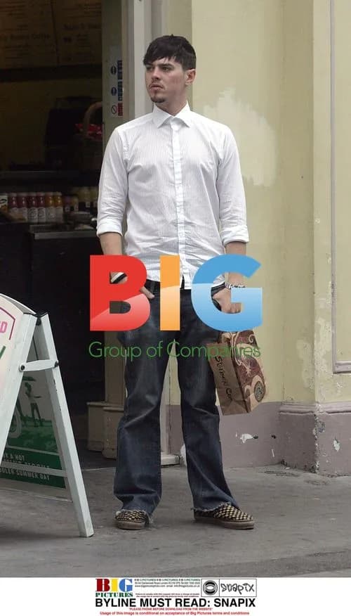Busted's Matt Jay Grabs Water at Cafe