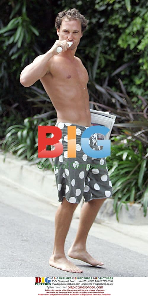 Matthew McConaughey brushes teeth while getting paper
