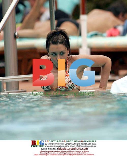 Michelle Heaton and Andy Scott-Lee Relax by Pool