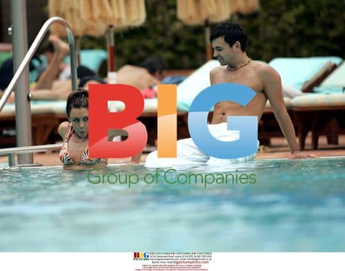 Liberty X singer Michelle Heaton and boyfriend Andy Scott-Lee relax by pool