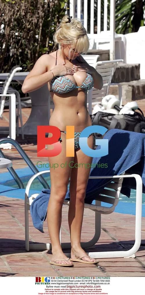 Model Michelle Marsh Sunbathing in Carribean