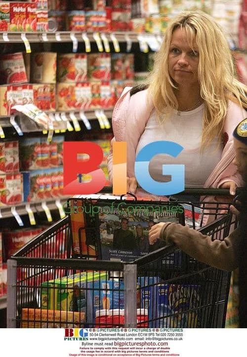 Pamela Anderson Braves Rain for Grocery Run