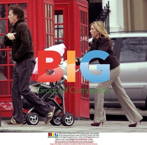 Paul McCartney with Heather Mills and baby