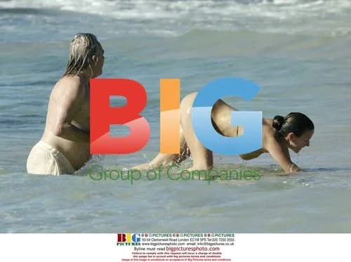 Peter Stringfellow and girlfriend in Barbados
