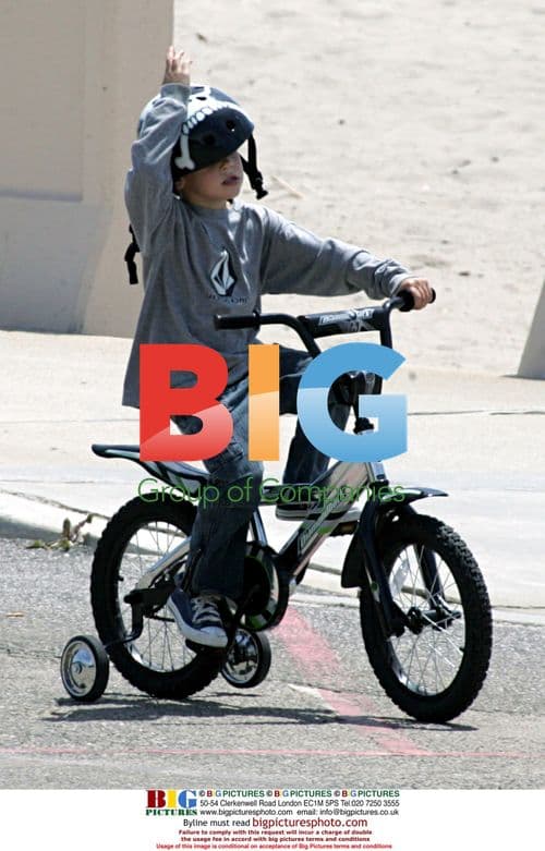 Pierce Brosnan takes son for bike ride