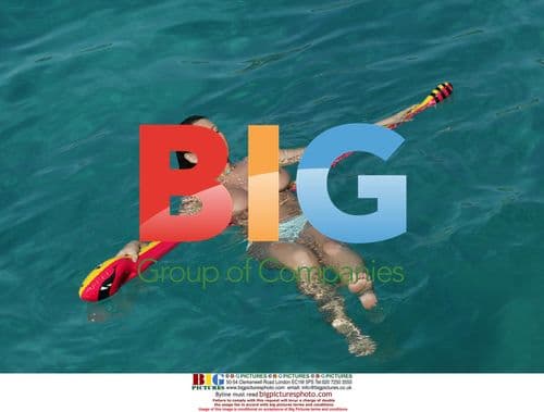 Lucy Pinder and Sophie Howard on beach