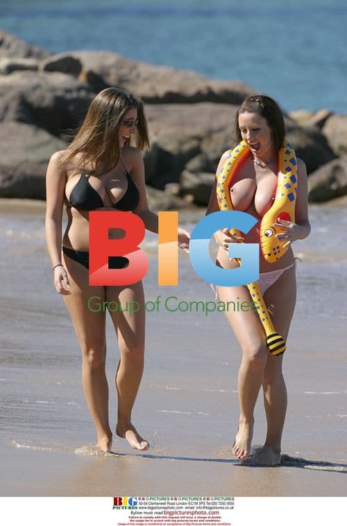 Lucy Pinder and Sophie Howard on beach in France