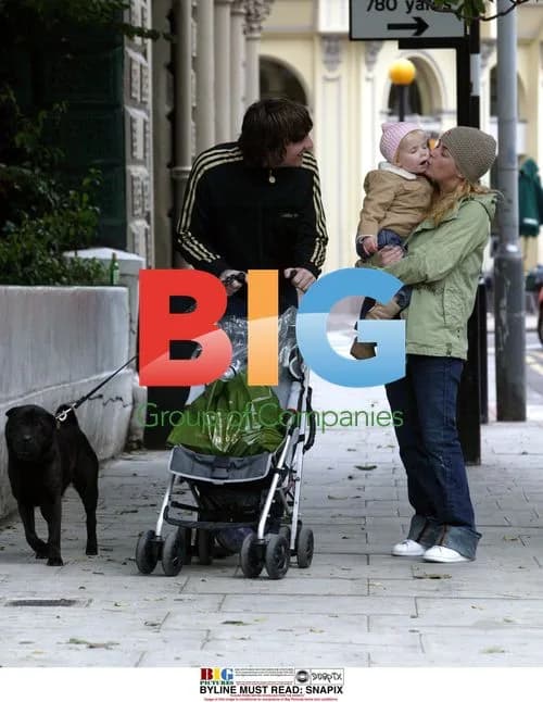 Gail Porter-Hipgrave and Dan Hipgrave stroll with family