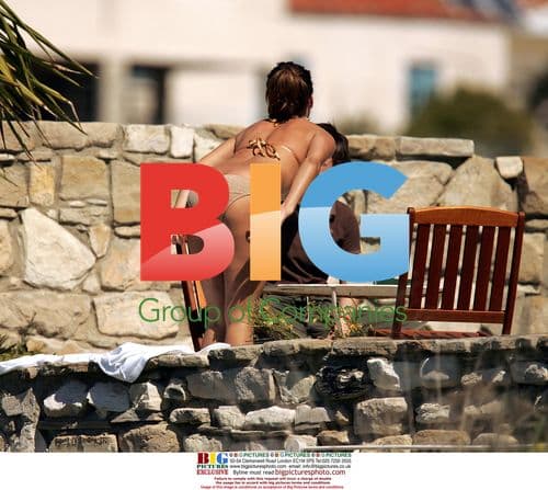 Rebecca Loos and friend play backgammon on holiday