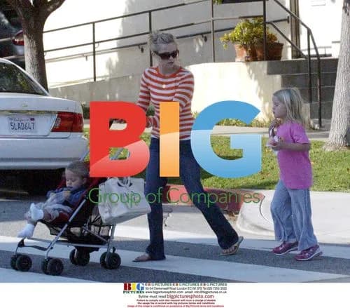 Reese Witherspoon out with kids