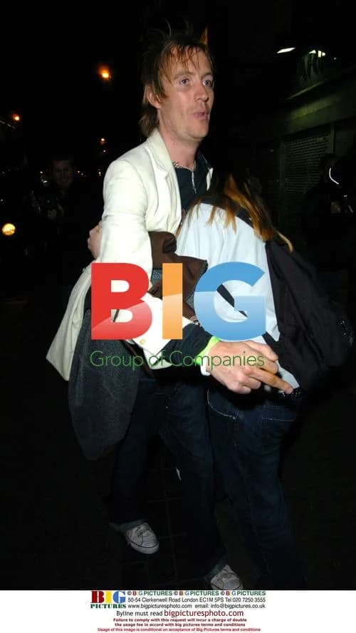 Rhys Ifans leaving Oasis gig in London