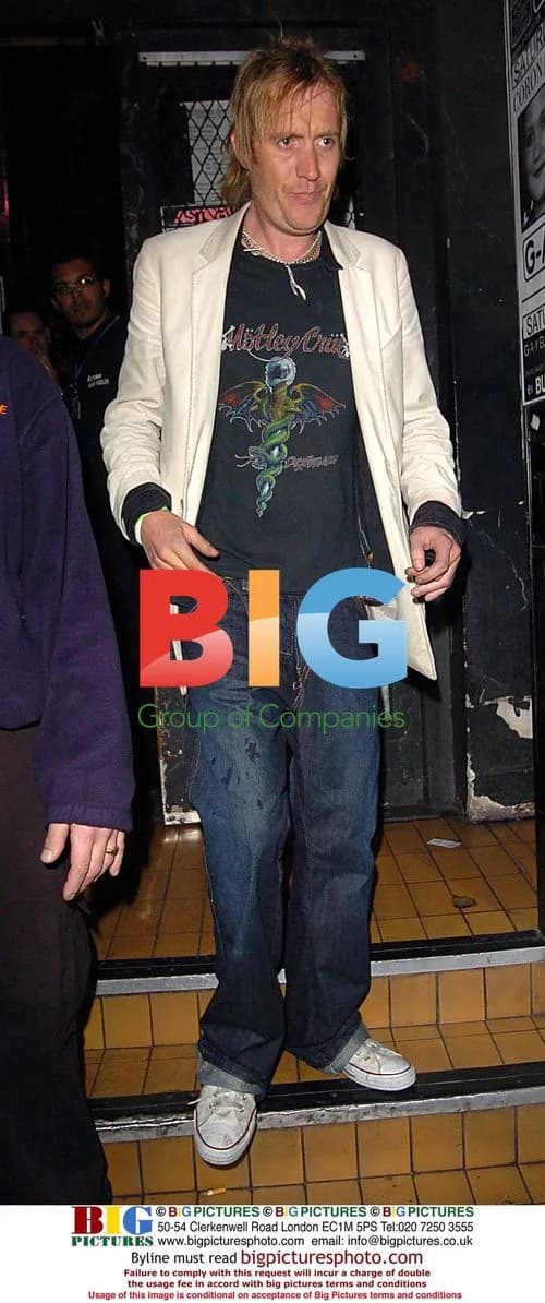 Rhys Ifans leaving Oasis gig in London