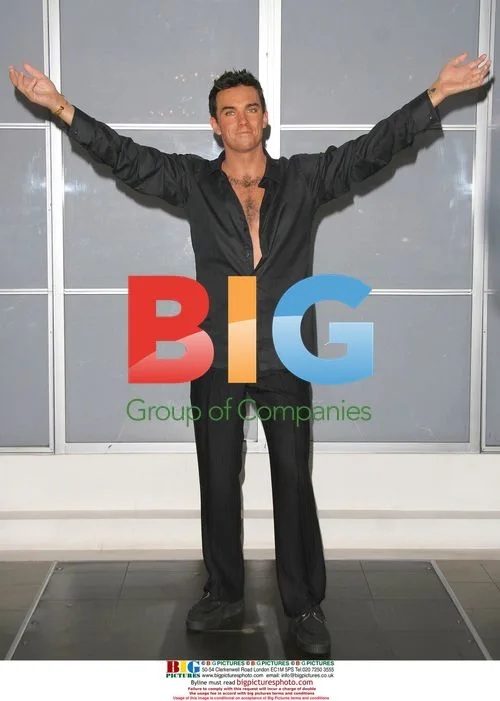 Robbie Williams Wax Figure at Madame Tussauds