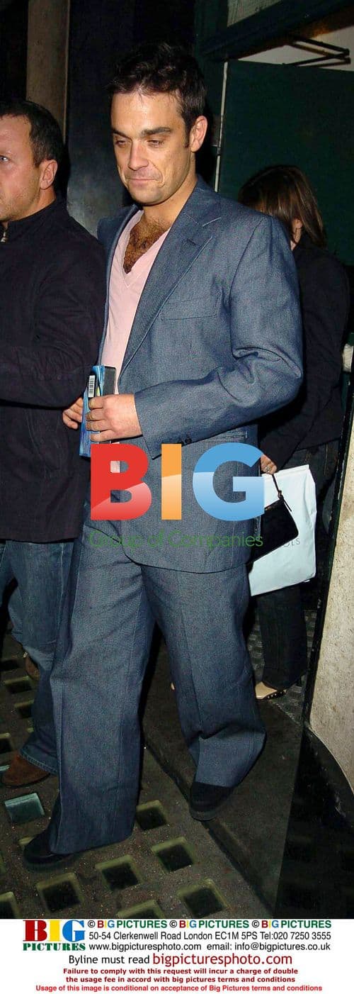 Robbie Williams Leaving The Ivy Restaurant