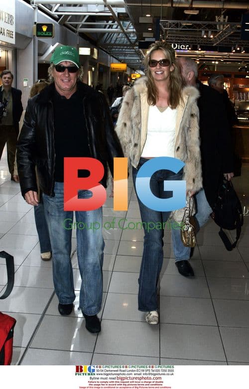 Rod Stewart and Penny Lancaster Depart London
