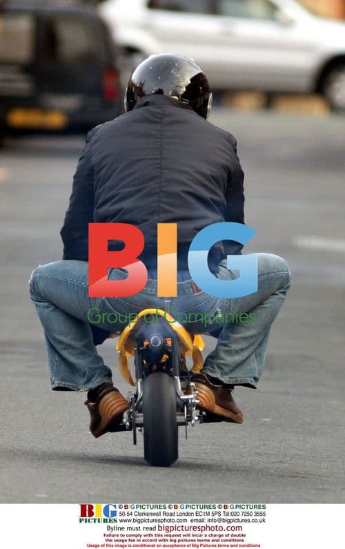 CORRIE HUNK RYAN THOMAS ON MOTORBIKE