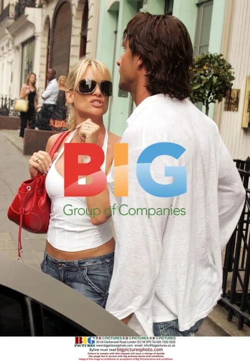 Nicollette Sheridan and fiancé shopping in London