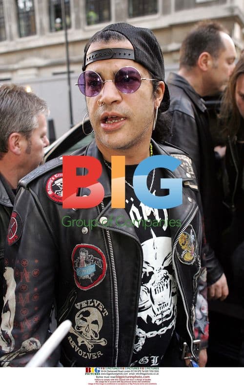 Slash Signing Autographs in London