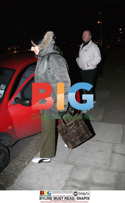 EASTENDERS star Steve McFadden comforted by female companion