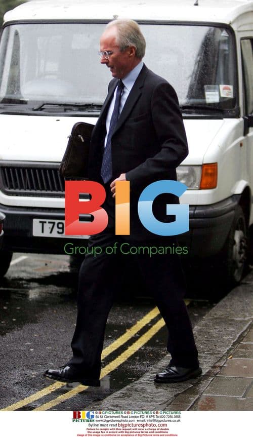 Eriksson Steps Out in Rain After Meeting