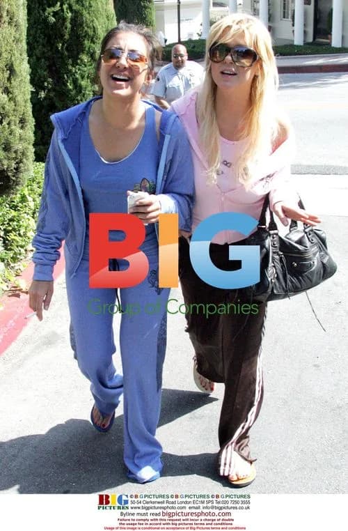 Chunky Tara Reid drinks and smokes with friend