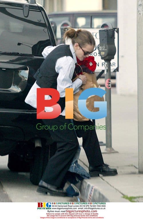 Winona Ryder Driving and Applying Makeup