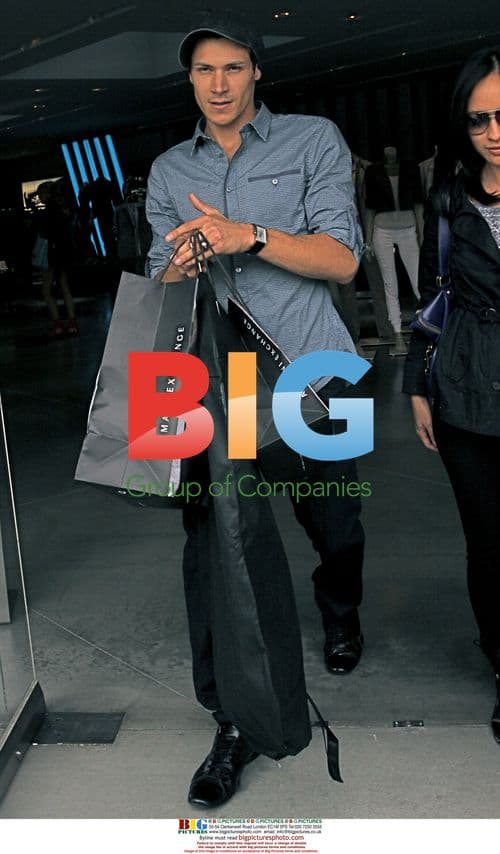 Alex Meraz Shopping at Armani Exchange