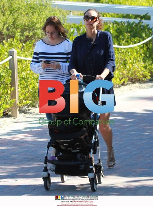 Lilly Kerssenberg and son Amadeus stroll in Miami