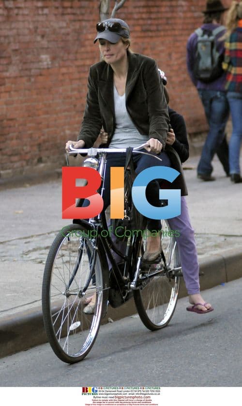 Frederique van der Wal bikes with daughter in NYC