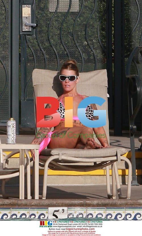 Melissa Smith, Jesse James Mistress Relaxes Pool-side