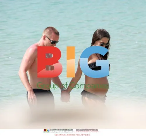 Pregnant Danielle Lloyd at the Beach