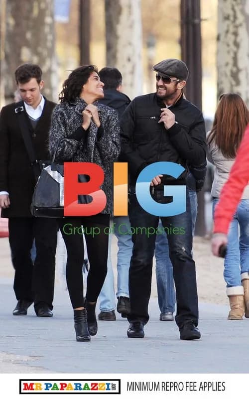 Gerard Butler and Laurie Cholewa strolling in Paris