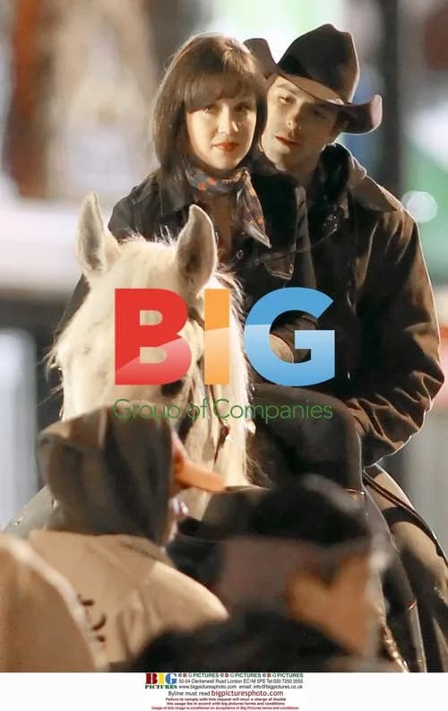 Scarlett Alice Johnson and Sean Faris on horseback