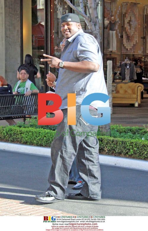 Quinton Aaron poses with fan in LA