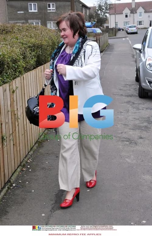 Susan Boyle Poses Outside Home