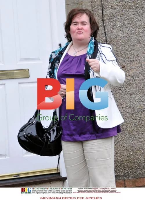 Susan Boyle Poses Outside Her Home