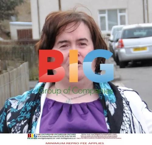 Susan Boyle Poses Outside Home
