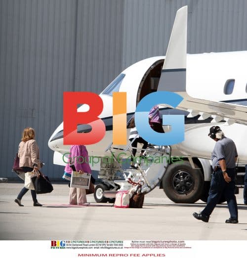 Dennis Hopper Boards Private Jet with Family