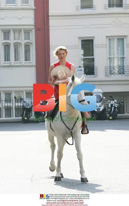 Jodie Kidd poses on horseback at Goodwood
