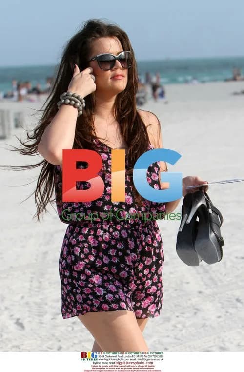 Khloe Kardashian Passing Out Dash Fliers in Miami