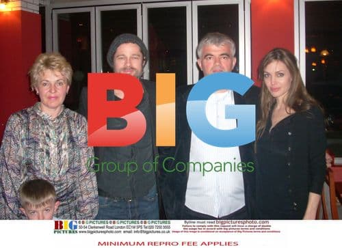 Angelina Jolie and Brad Pitt with Bosnian Family