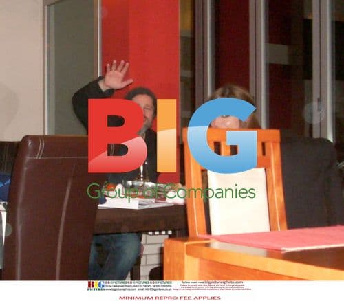 Angelina Jolie and Brad Pitt with Bosnian family