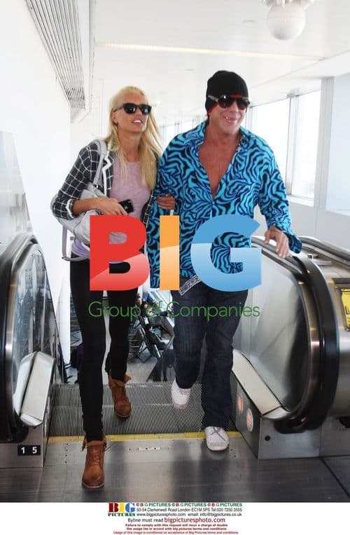 Mickey Rourke Arrives at NYC Airport