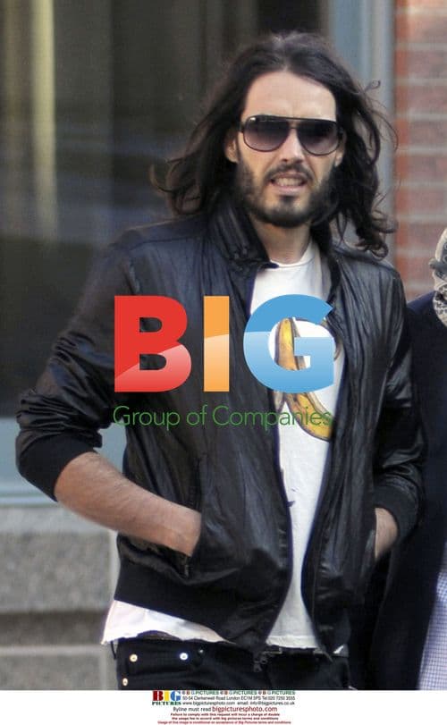 Russell Brand Leaves NYC Hotel in Banana Tee