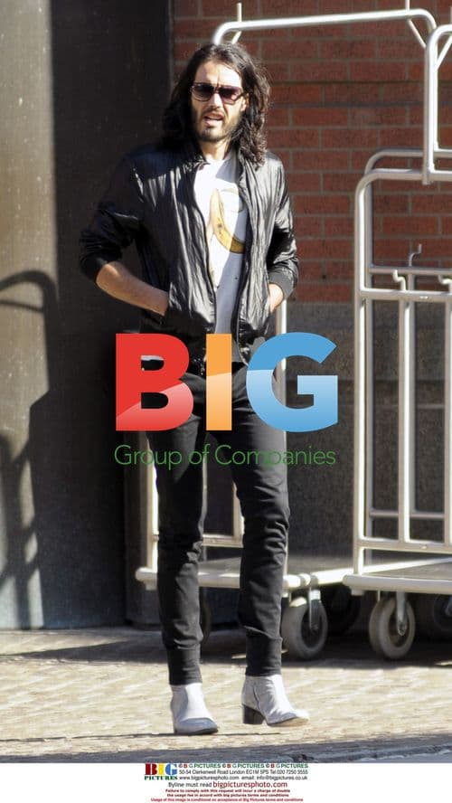 Russell Brand in Banana Tee Leaving NYC Hotel