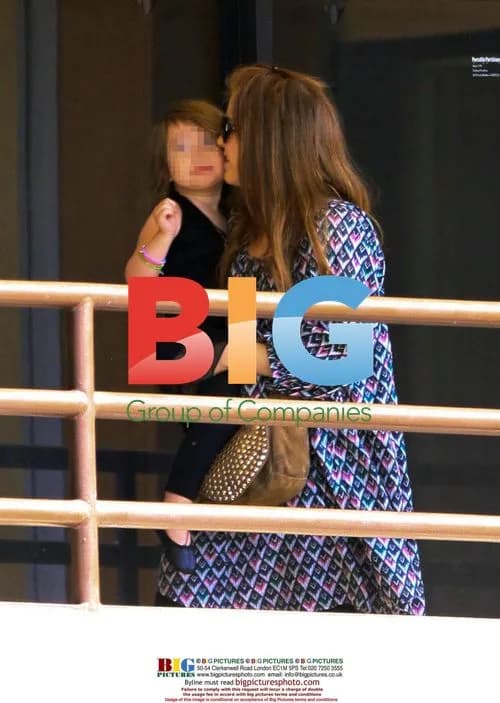 Isla Fisher kisses daughter Olive before dance class