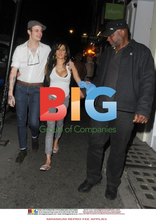 Amy Winehouse and Blake Fielder-Civil Leaving Jazz After Dark