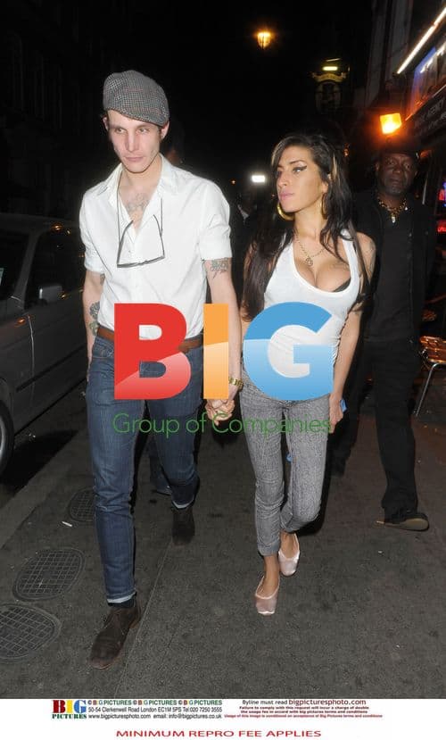 Amy Winehouse and Blake Fielder-Civil Leaving Jazz After Dark